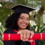 Aga Khan Foundation Scholarships 2027 – African graduate student in cap and gown
