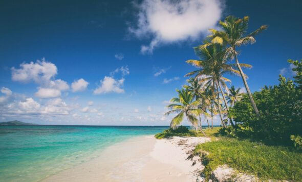 Caribbean CBI 2026 African investors — turquoise Caribbean beach