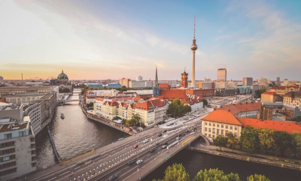 Germany EU Blue Card 50700 salary 2026 — Berlin skyline at dusk