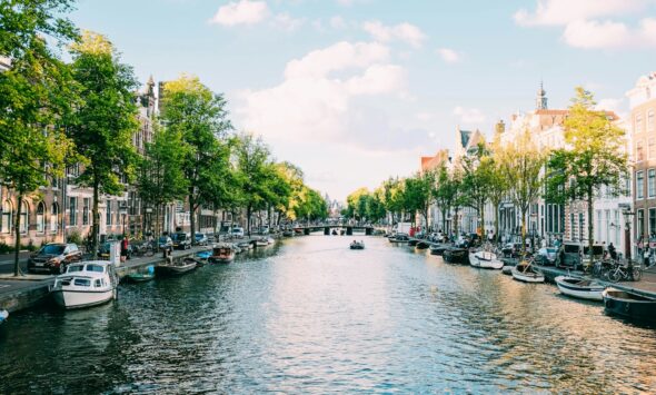 Netherlands Highly Skilled Migrant Visa 2026 Amsterdam canal scene