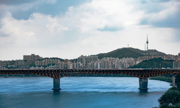 South Korea E-7 visa 2026 Seoul skyline African engineer professional