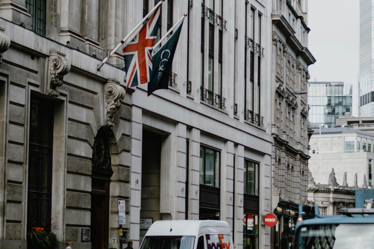 Healthcare workers in scrubs &mdash; UK Health and Care Worker Visa 2026 guide for African applicants