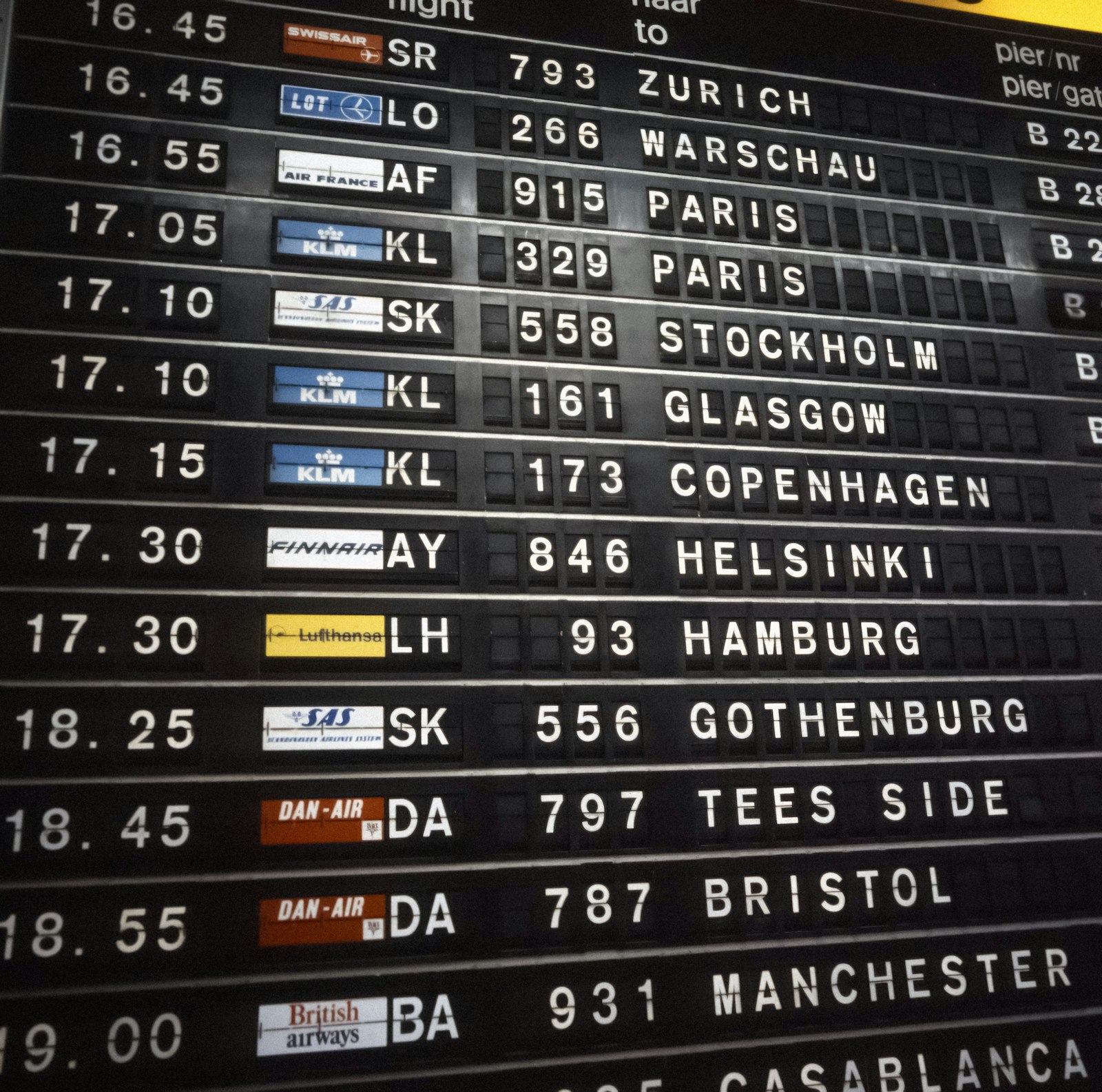 Cost to move abroad 2026 shown on an airport departures board