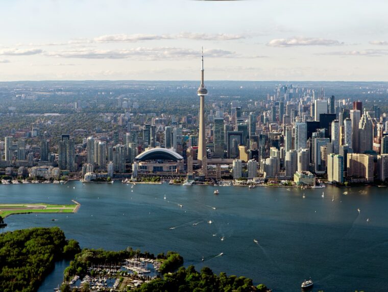 cost to move to Canada 2026 budget, Toronto CN Tower skyline