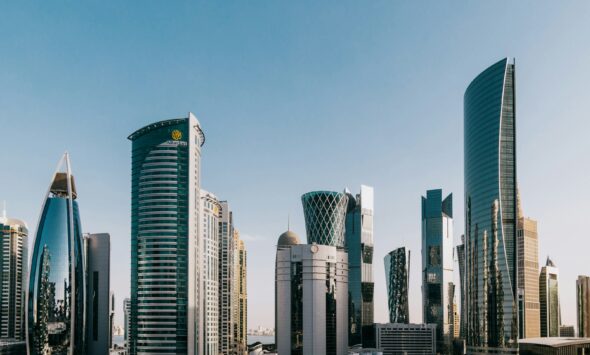 Qatar company formation founder overlooking the Doha skyline