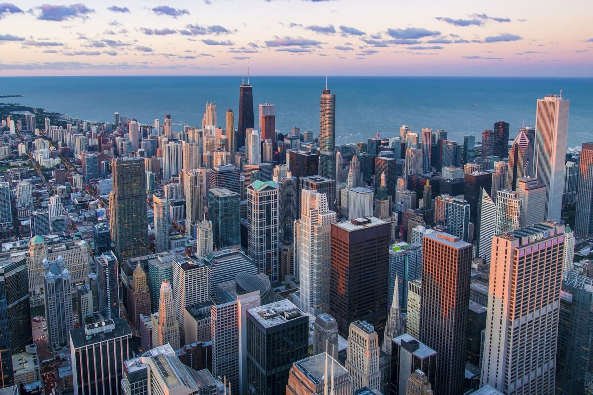 US adjustment of status interviews in 2026, Chicago skyline at dusk