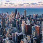 US adjustment of status interviews in 2026, Chicago skyline at dusk